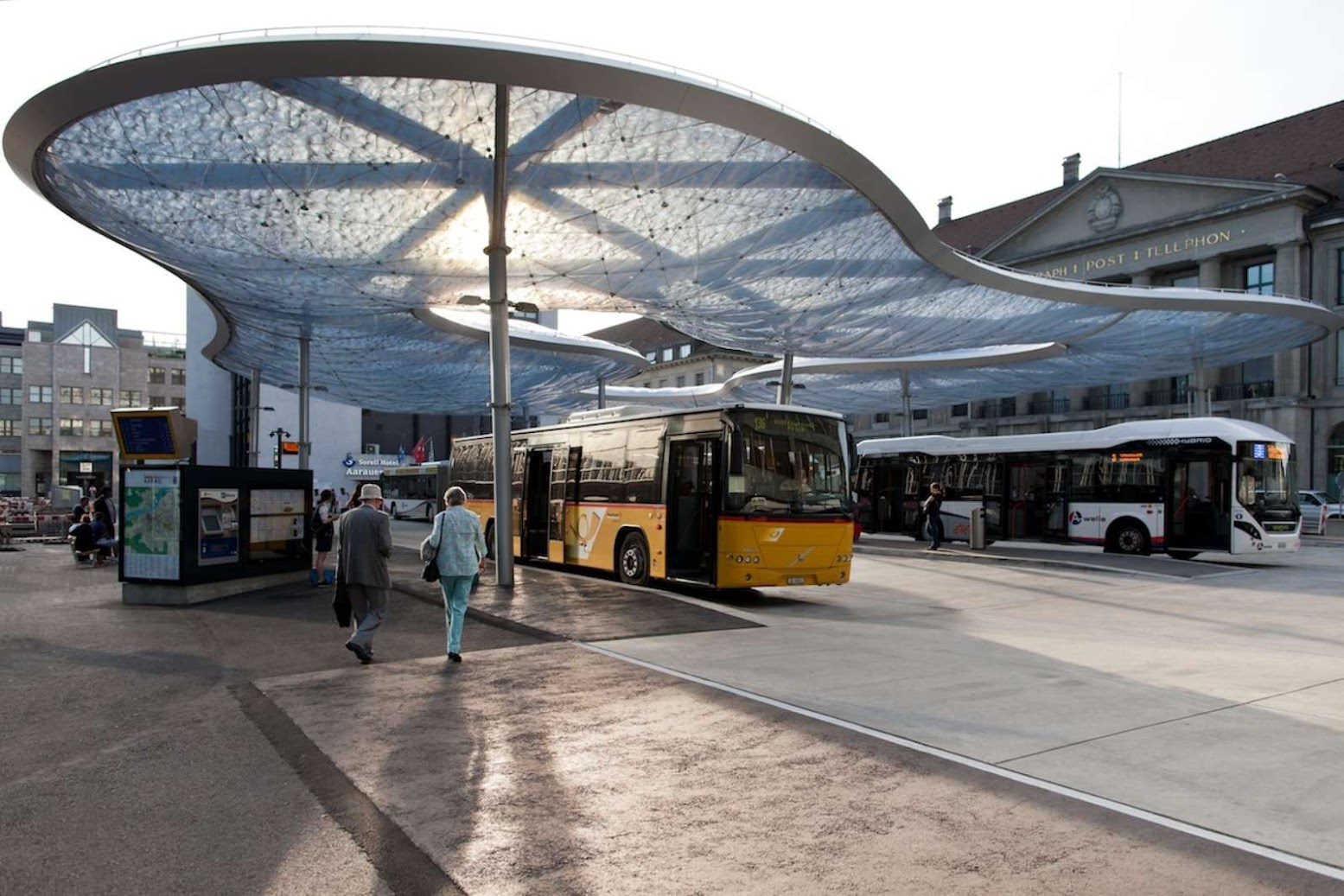 Bus terminal and train station square by Vehovar