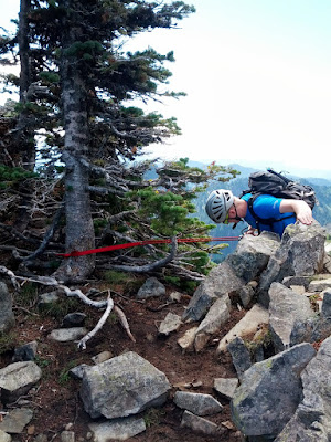 Rappelling the 4th class gully, could be down climbed fairly easily as well