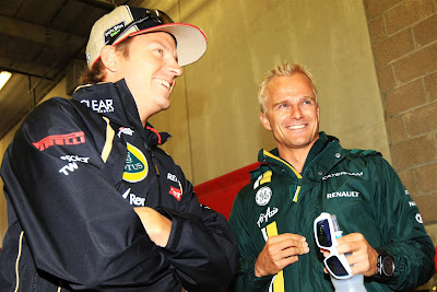 улыбающиеся Кими Райкконен и Хейкки Ковалайнен на Гран-при Бельгии 2012