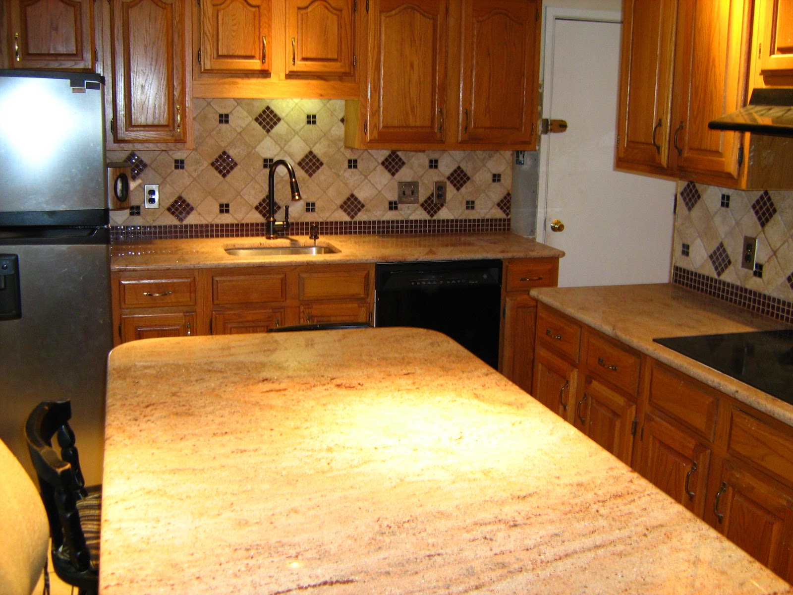 Kitchen countertops and backsplash Glass Backsplash with Granite Countertops
