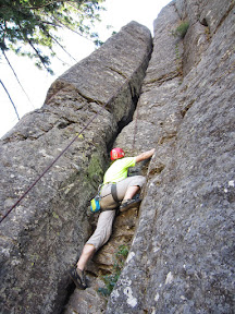 Climbing Reach Deep (5.7), an offwidth