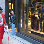 He had the boombox blaring his personal soundtrack as he walked down the street...the red leather shoes made the outfit