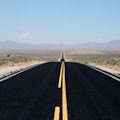 movie - The highway that runs through Rachel, Nevada draws enthusiasts who probably enjoy what movie genre? Image_answer_130x130_highway