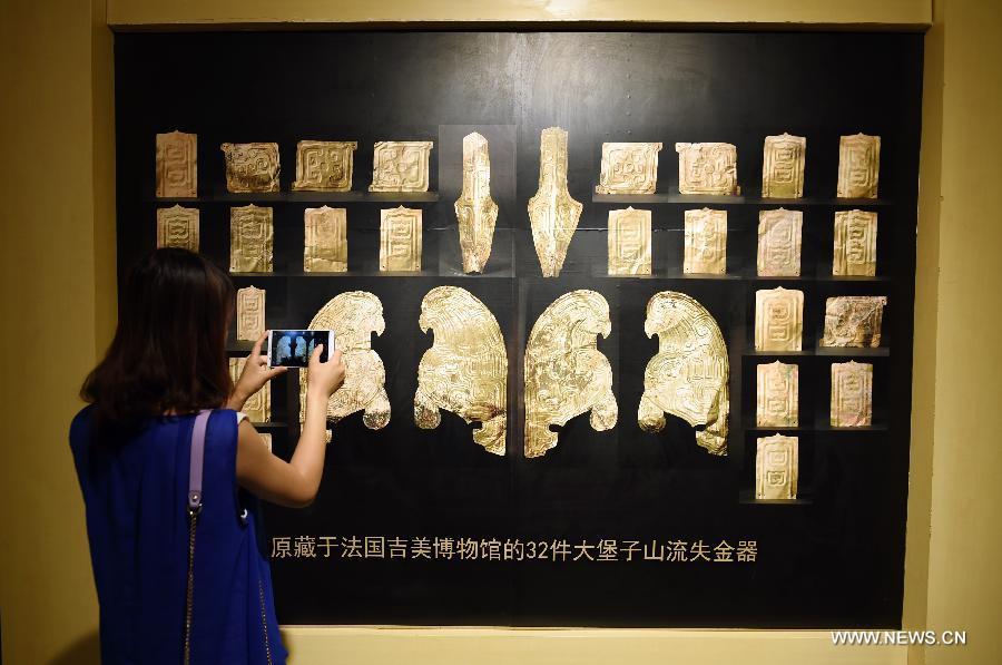 France returns looted gold antiquities to China France returns looted gold antiquities to China