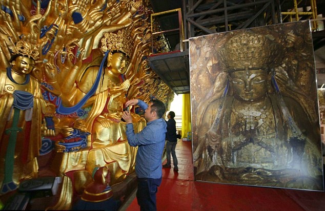 800-year-old Buddhist statue of 'goddess with thousand hands' restored to former glory 800-year-old Buddhist statue of 'goddess with thousand hands' restored to former glory