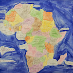 Here's the finished end product. Notice the water color for the ocean, the careful coloring in of the lines, and the cursive handwriting for the country names. Montessori elementary students often know more countries of the world than adults do!