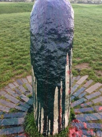Ancient standing stone daubed with paint Ancient standing stone daubed with paint
