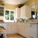Haberfelde Kitchen - This extensive remodeling project created a very functional kitchen, while keeping the charm of the older home including the use of hand-painted tiles and an old-fashioned faucet.