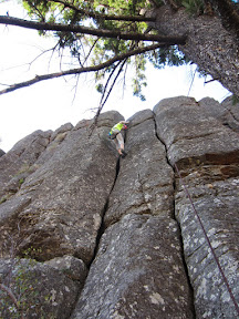 Aaron lowering down after climbing Unfit (5.6)