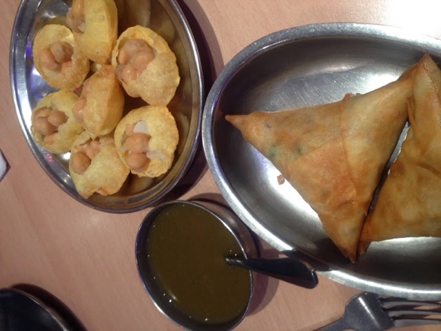 Gol guppa and samosas with tangy tamarind sauce Samosas and gol guppa (chickpeas in rice flour balls) with tamarind sauce