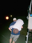 Then Luke picked Tony up and carried him back to the bus...with Scotty's hat on