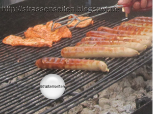 Wuerste und Schnitzel auf einem Grill 250