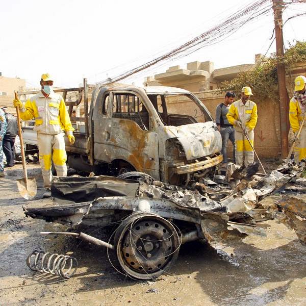 One of the car bombs exploded near the University of Technology in the Karrada district of central Baghdad, killing three people and wounding at least 10. One of the car bombs exploded near the University of Technology in the Karrada district of central Baghdad, killing three people and wounding at least 10.