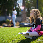 We love to take students out in the world. Here, a student is taking her writing outside, to be inspired by nature. A change of scenery can be an important way to make learning "stick" better.