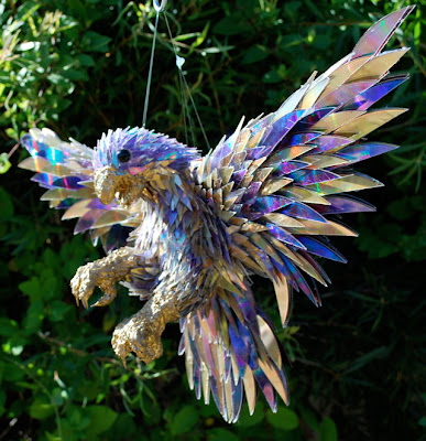 Animal Sculptures Made From Shattered CDs Seen On www.coolpicturegallery.us Animal Sculptures Made From Shattered CDs Seen On www.coolpicturegallery.us