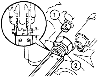 Установка регулировочного винта главного топливного жиклера на требуемую глубину под торцевой поверхностью заглушки