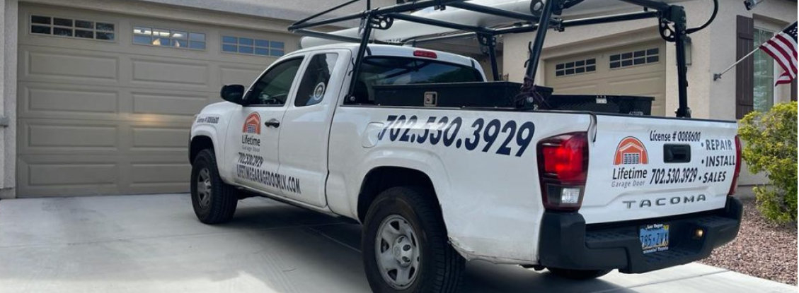 A picture containing text, road, truck, car

Description automatically generated
