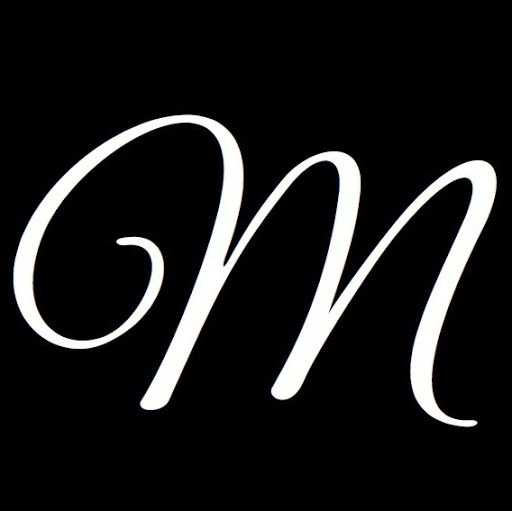 Mane Tamers Hair Design logo