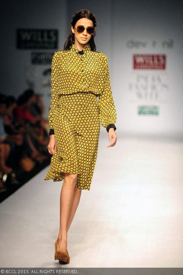Alecia Raut showcases a creation by fashion designers Dev r Nil on Day 3 of Wills Lifestyle India Fashion Week (WIFW) Spring/Summer 2014, held in Delhi.