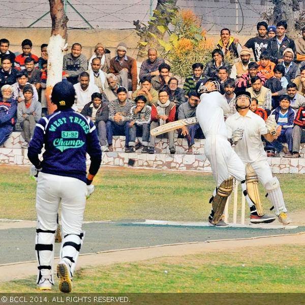 The cricket match in progress at the final of the Tihar Winter Olympic Cricket 2013-14 in the ground of jail no. 1 in Delhi.