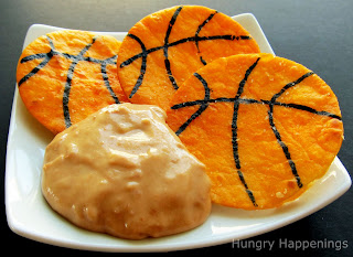 basketball tortilla chips served with bean and cheese dip