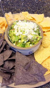 Guacamole from Food Network chefs:  The Rick Bayless Recipe- Sundried Tomato Guacamole