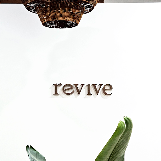 Revive Nails & Co. logo