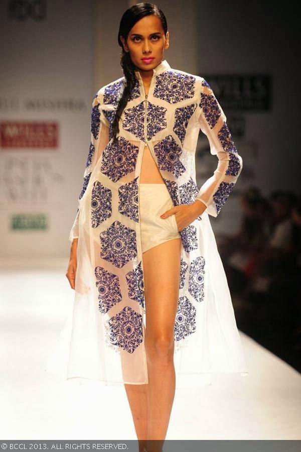 A model walks the ramp for fashion designer Rahul Mishra on Day 2 of the Wills Lifestyle India Fashion Week (WIFW) Spring/Summer 2014, held in Delhi.