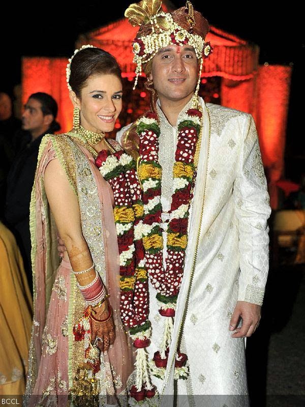 Singer, actress Raageshwari Loomba with her groom Sudhanshu Swaroop during their wedding, held in Mumbai, on January 27, 2014.