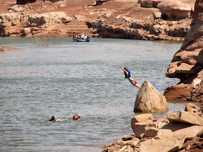 My family swimming and jumping in the water