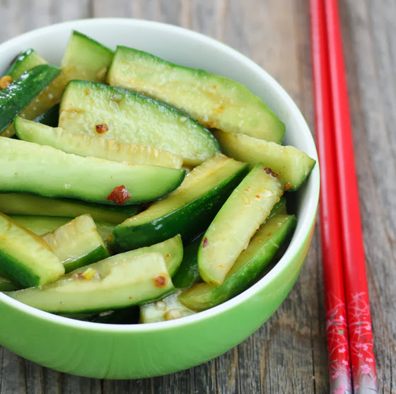 photo of Chinese Spicy Cucumber Salad with red chopsticks