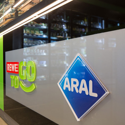 REWE To Go bei Aral logo