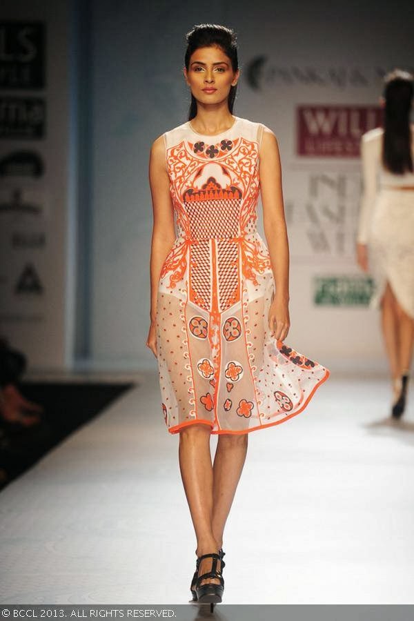 A model walks the ramp for designer duo Pankaj and Nidhi on Day 2 of the Wills Lifestyle India Fashion Week (WIFW) Spring/Summer 2014, held in Delhi.