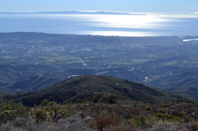 a thin trail follows the ridge line