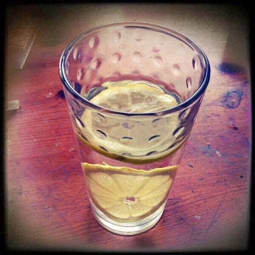 Glass of water with a slice of lemon