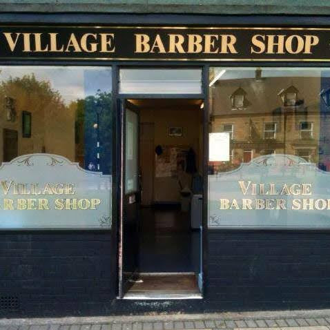 Village Barber Shop logo