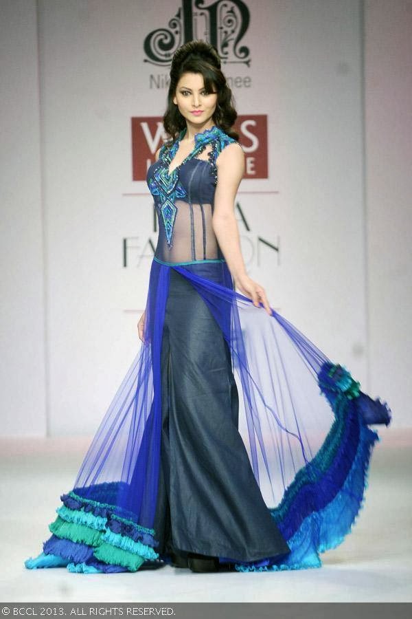 Urvashi Rautela walks the ramp as showstopper for fashion designers Niket and Jainee on Day 3 of the Wills Lifestyle India Fashion Week (WIFW) Spring/Summer 2014, held in Delhi.