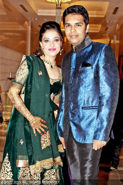 Varshita and Sanjay pose for shutterbugs during their sangeet bash, held in the city recently.