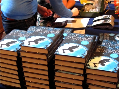 A pile of copies of The Ocean at the End of the Lane