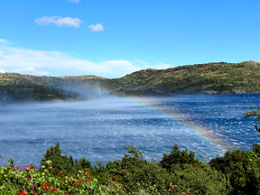 Crazy winds create water sprays = rainbows