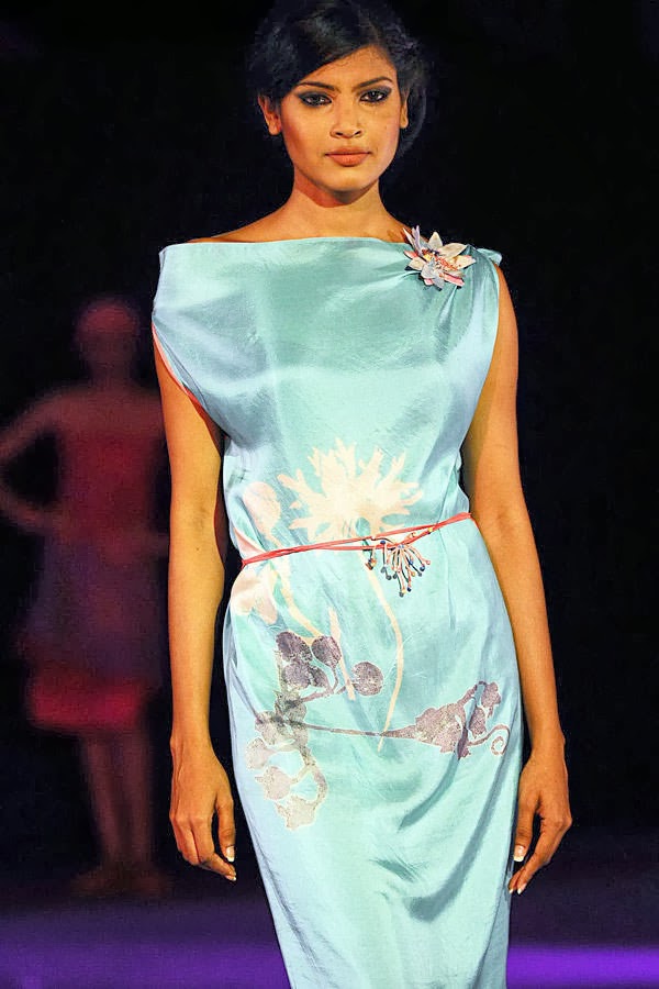 A model displays a creation by fashion designer Arra at the annual HSBC Resort fashion week in Galle on October 5, 2013.