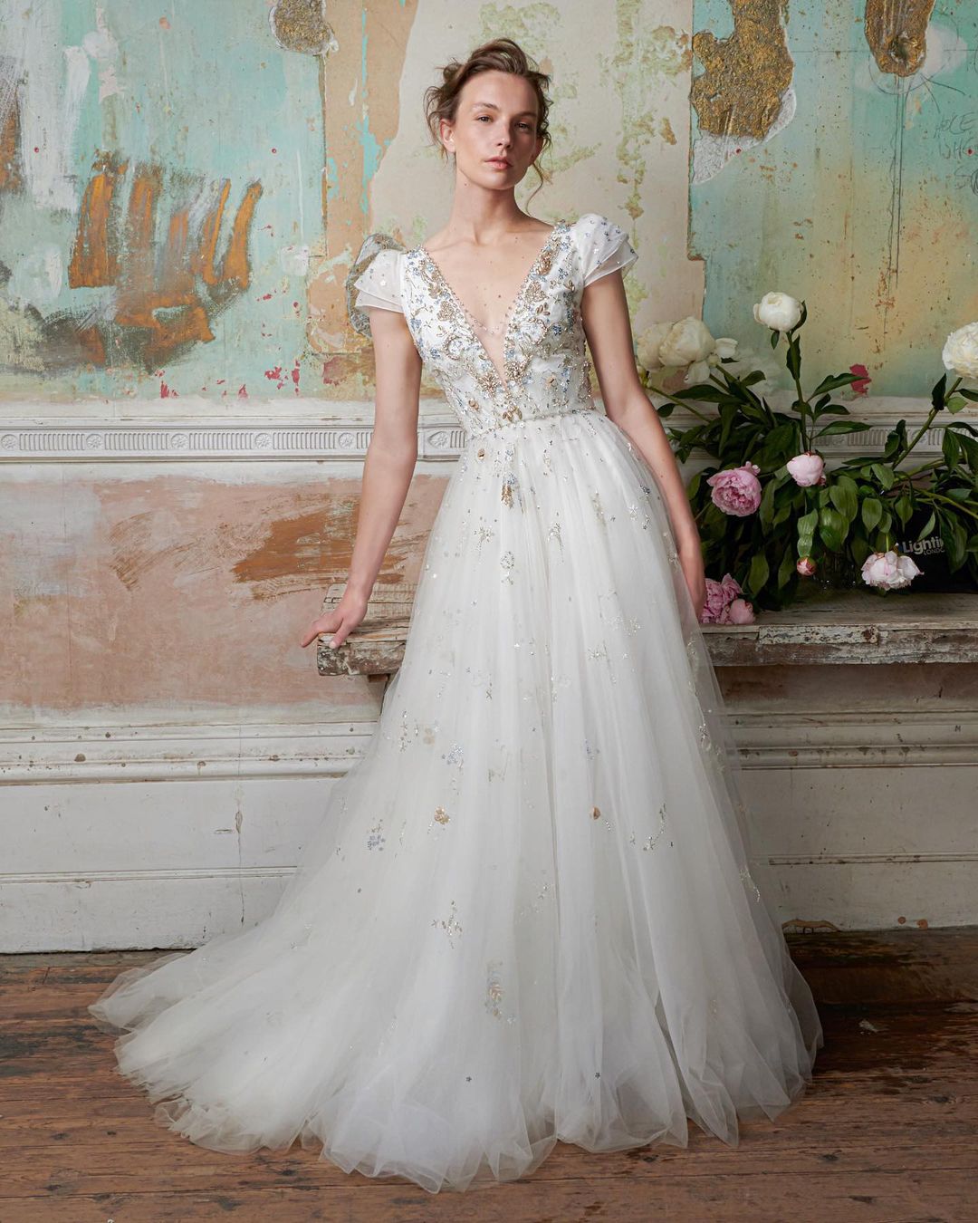 Shine in this stunning wedding gown by Jenny Packham.