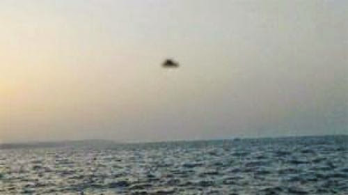 Tourists Snap Photo Of Ufo Over Sea World In Buenos Aires Argentina
