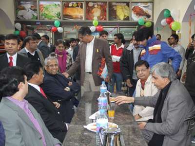 Dinesh Singh, Vice Chancellor, DU with members of IRCTC during the Indian Railway Catering and Tourism Corporation's (IRCTC)cafeteria launch at Delhi University.