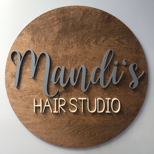 Mandi's Hair Studio & Boutique logo