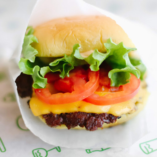 Shake Shack The School Yard logo