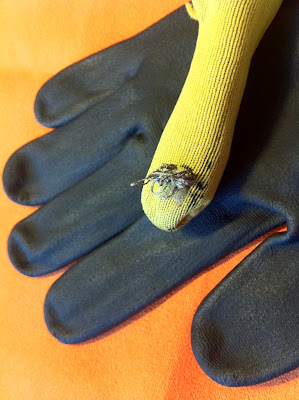 Conductive thread loose on the inside of the glove