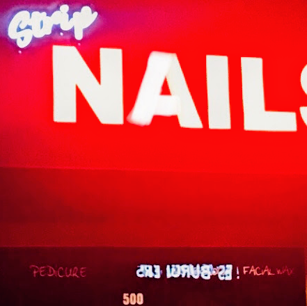 Strip Nails logo