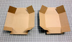 I then cut along the short folds at either end of each box piece and folded the flaps up. You can see the box taking shape!