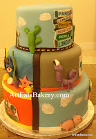 Disney - Pixar kid's birthday cake with Cars, cacti , finding Nemo starfish, Monsters Inc. Toy Story pig and the Incredibles